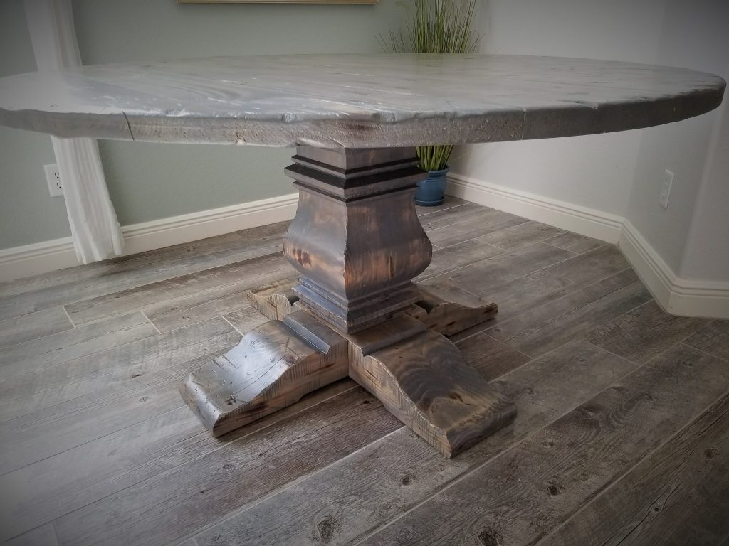 60 round gray distressed table with massive pedestal