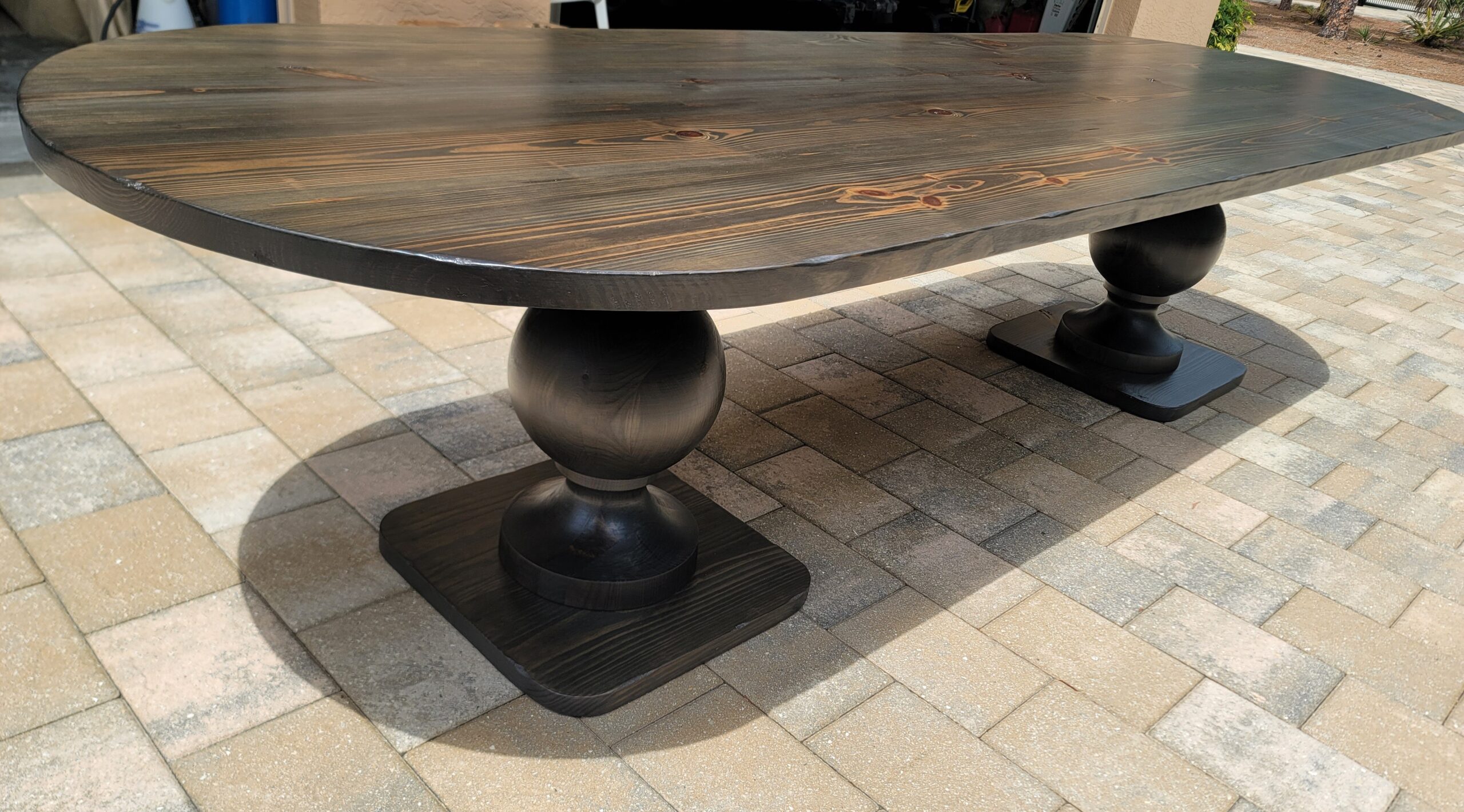 Oval ball pedestal trestle table in onyx